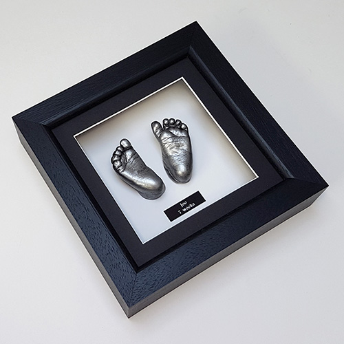 Luxury Hardwood 8x8 Black frame with antique silver feet cast of a 7 week old