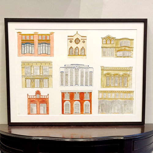 Architectural drawings in a chocolate frame with mount