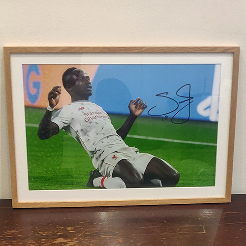 Signed footballer print in slim real oak frame