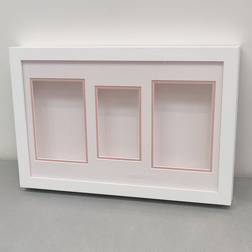 Classic 16x10 Triple White frame with Subtle Pink front and back mount and Pink undermount.