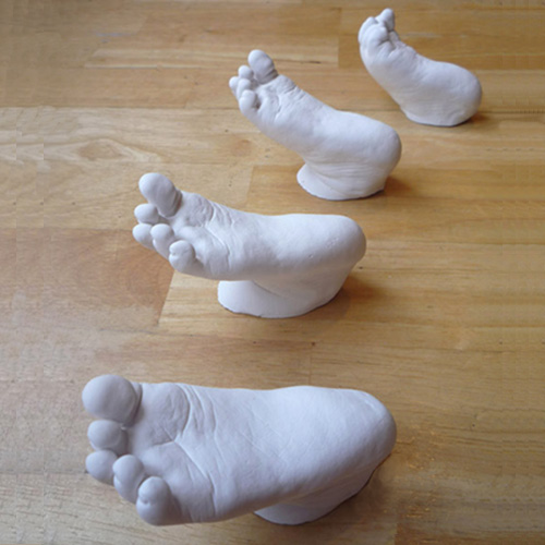 4 white foot casts