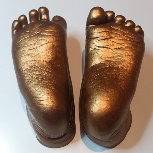 Gold feet casts of a 1 year old