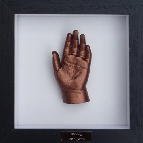 Contemporary 8x8 Square Black frame with a bronze hand cast of a 3 year old
