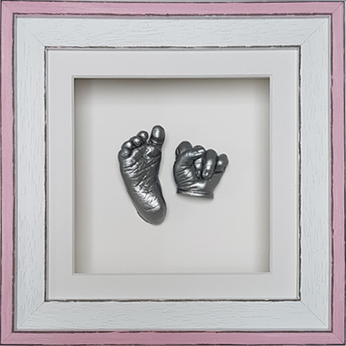 Coastal 8x8 Square Pink frame with White mounts and silver casts of a 3 month old baby