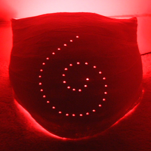 Belly cast with spiral of holes and red nursery light