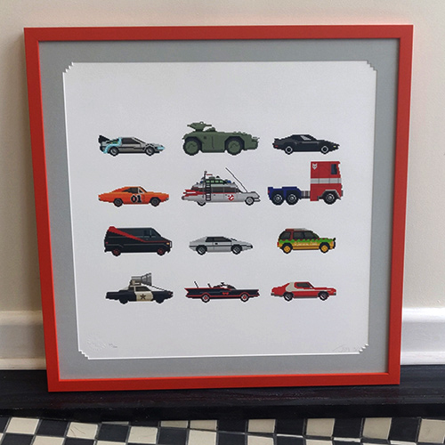 Pixelated vehichles print in a bright orange frame with grey stepped corner mount